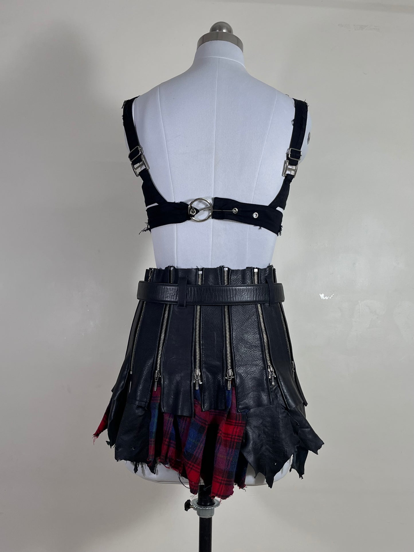 Reconstructed leather/ plaid skirt